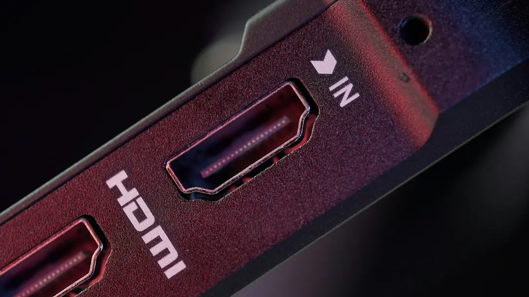 Close-up of an HDMI IN port on the back of a TV, where a streaming stick plugs in for the IPTV Free Trial on Firestick